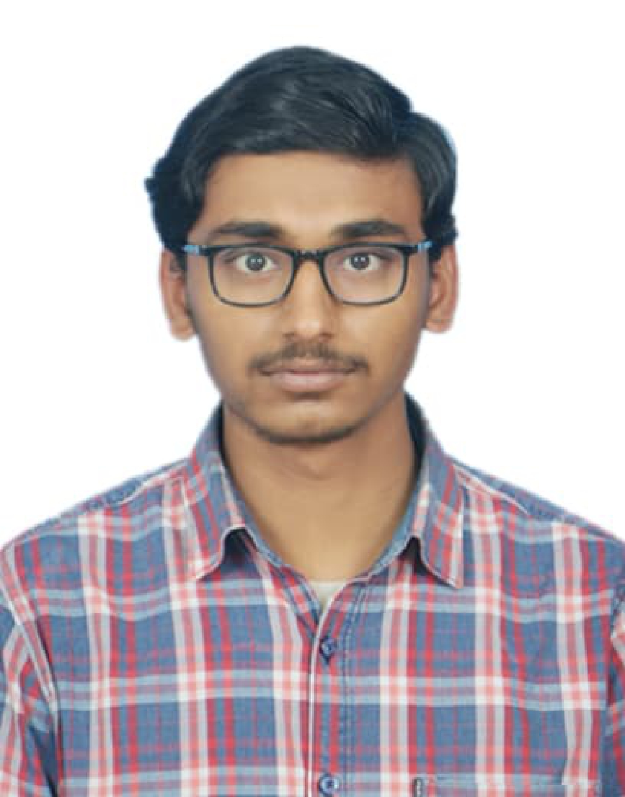 Vinay kumar working at his modern desk with multiple monitors and coding setup